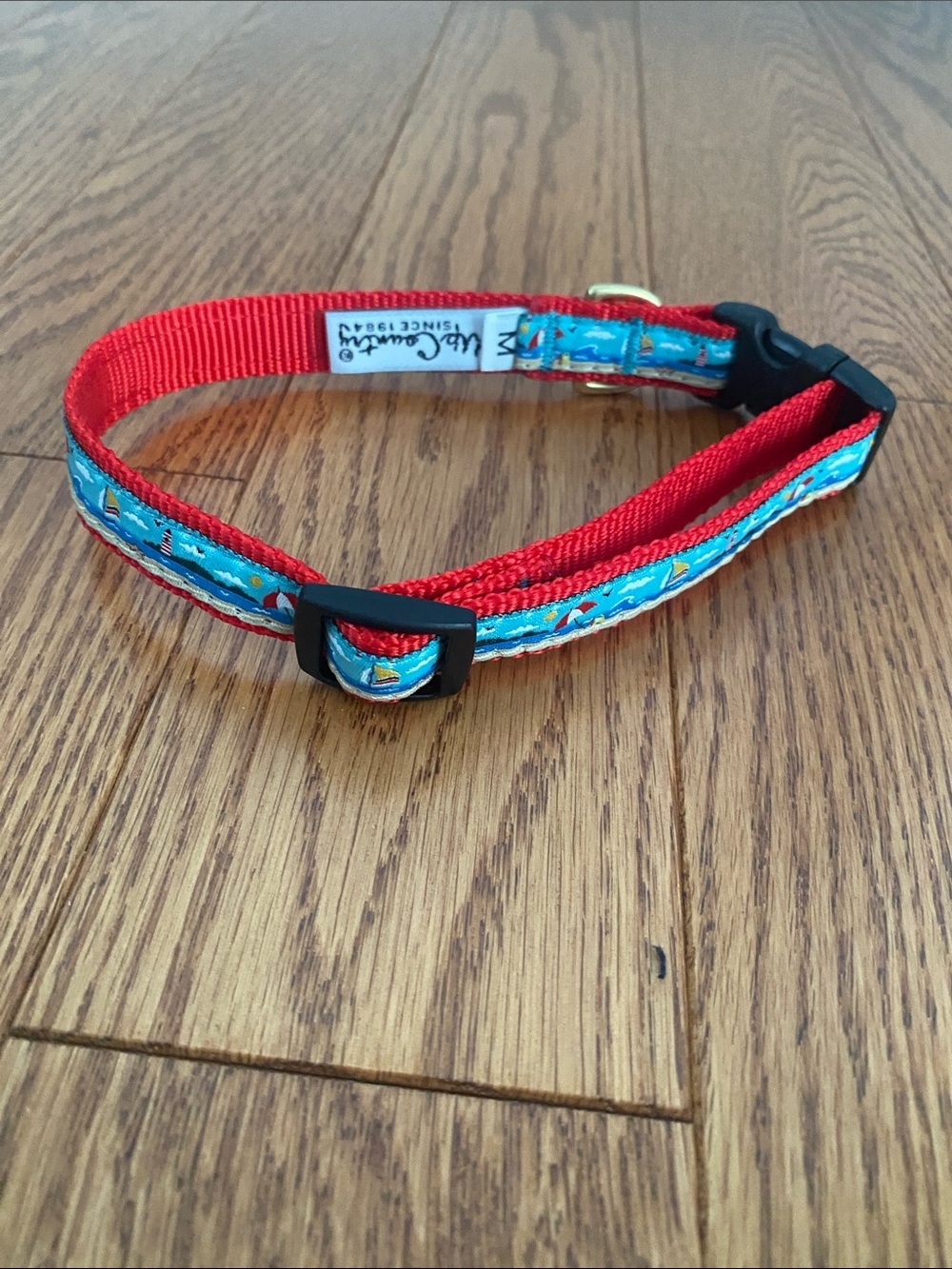 Red Patterned Dog Collar with Blue Sailboat Accent by Unknown